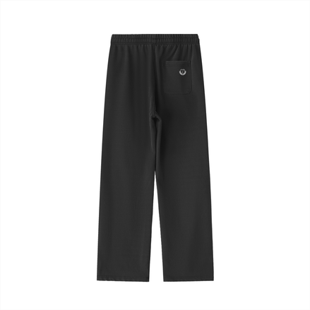 the back of black vintage washed sweatpants